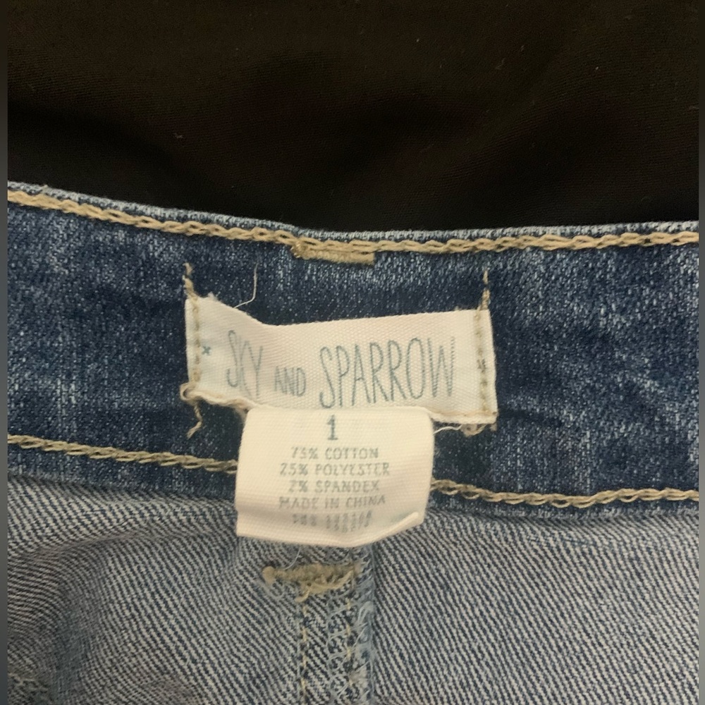 Sky and Sparrow distressed jean skirt.